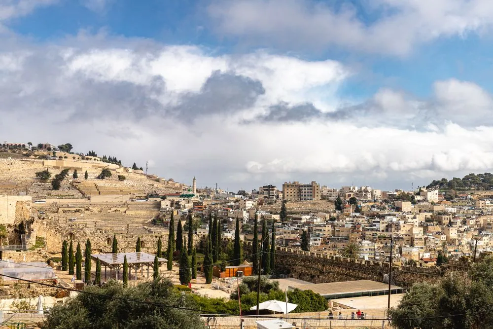 Jerusalem from a nearby hill, the old city walls and cemetery in the foreground