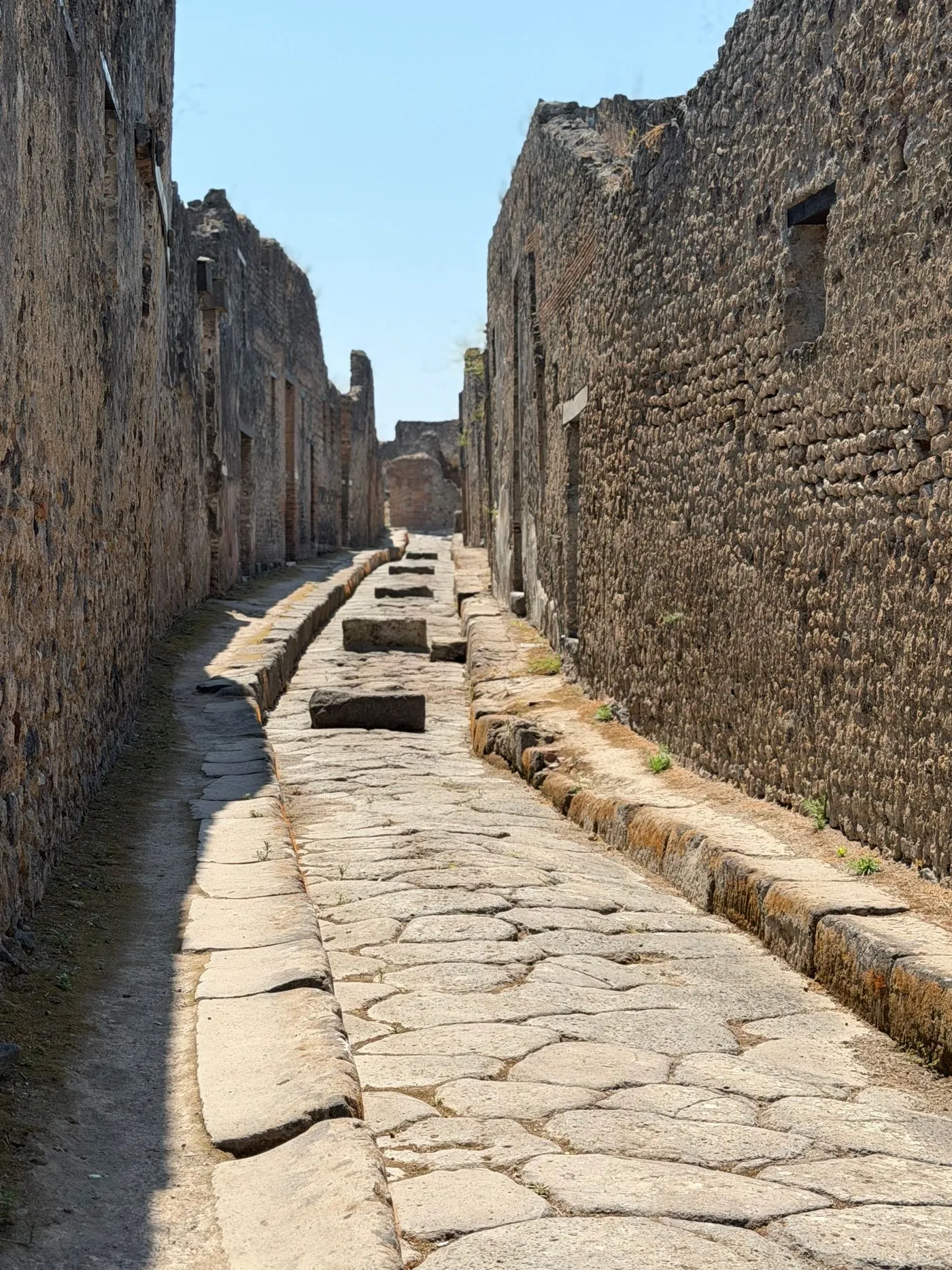 A preserved stone street in ancient Pompeii